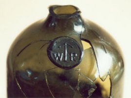 Black glass seal with WR and arrow  from the reign of William IV