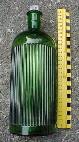 emerald green with arrow on base