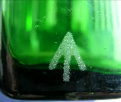 close-up of etched arrow